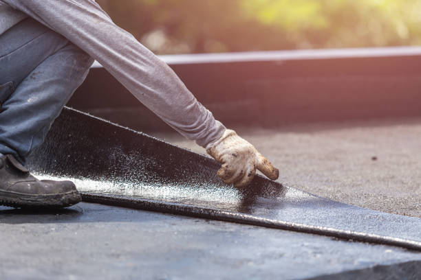 Professional Basement Waterproofing technician working in Greenlawn, NY